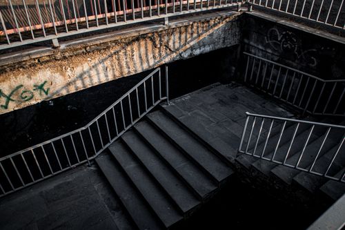 Free Brutalist urban stairs in Yerevan with dramatic lighting and gritty atmosphere. Stock Photo