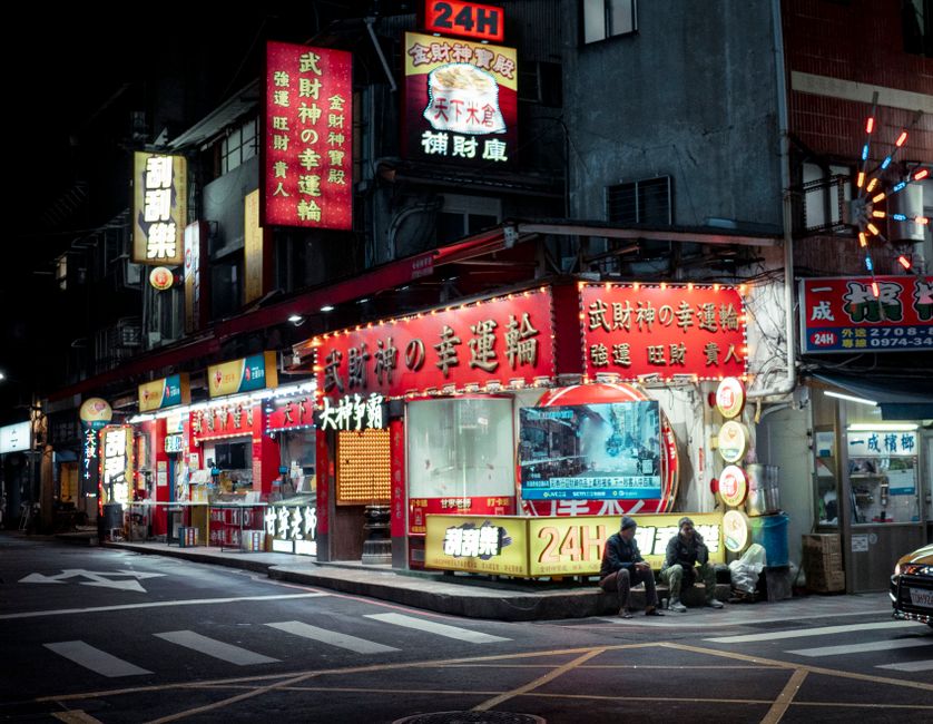 Vibrant Shilin Night Market in Taipei, Taiwan with various street food stalls