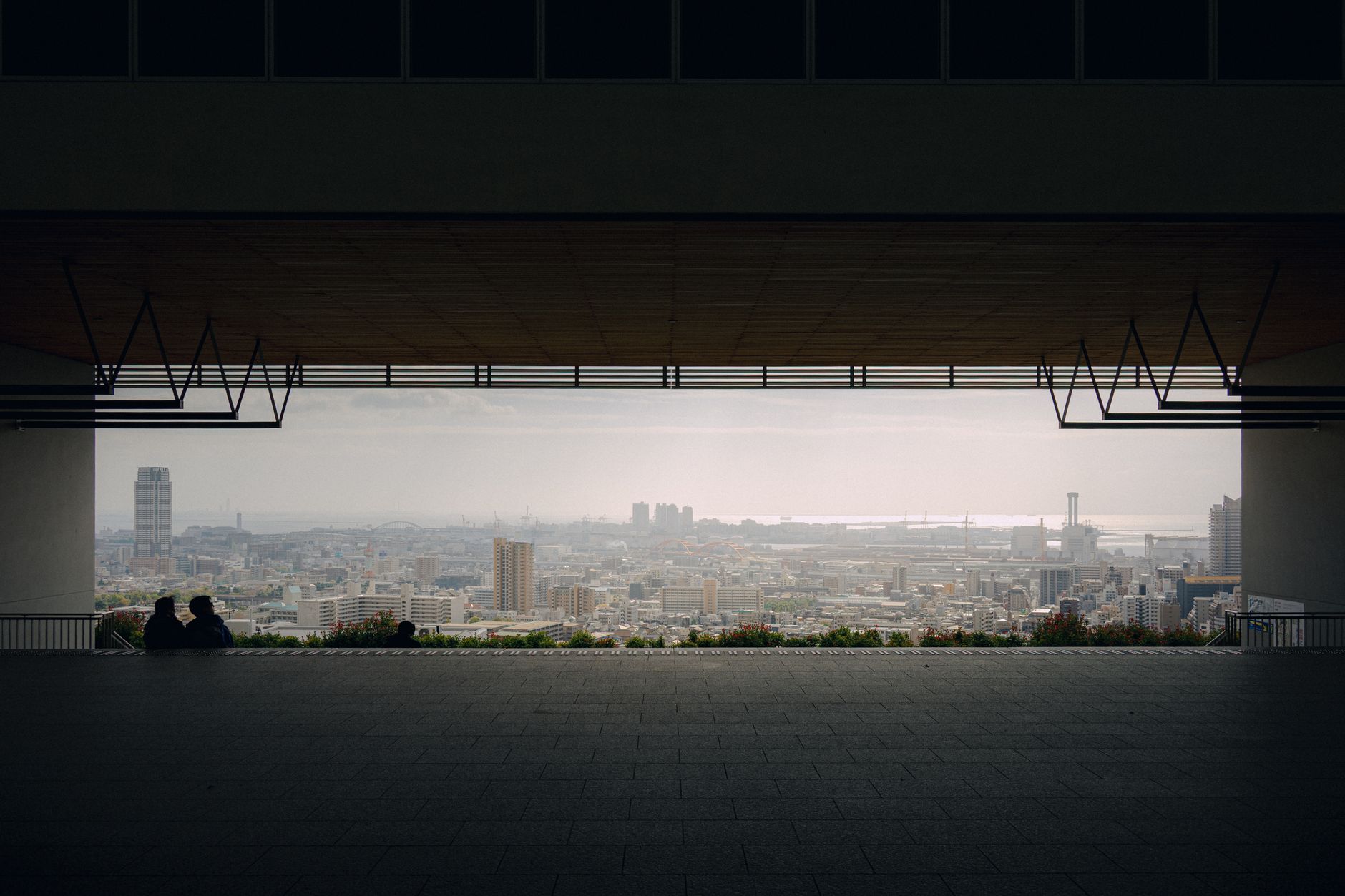 Executive leadership workshop overlooking a modern city skyline