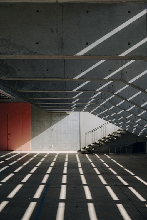 Building Edge Shadow Modern Architectural Building with Dramatic Shadows · Free Stock Photo