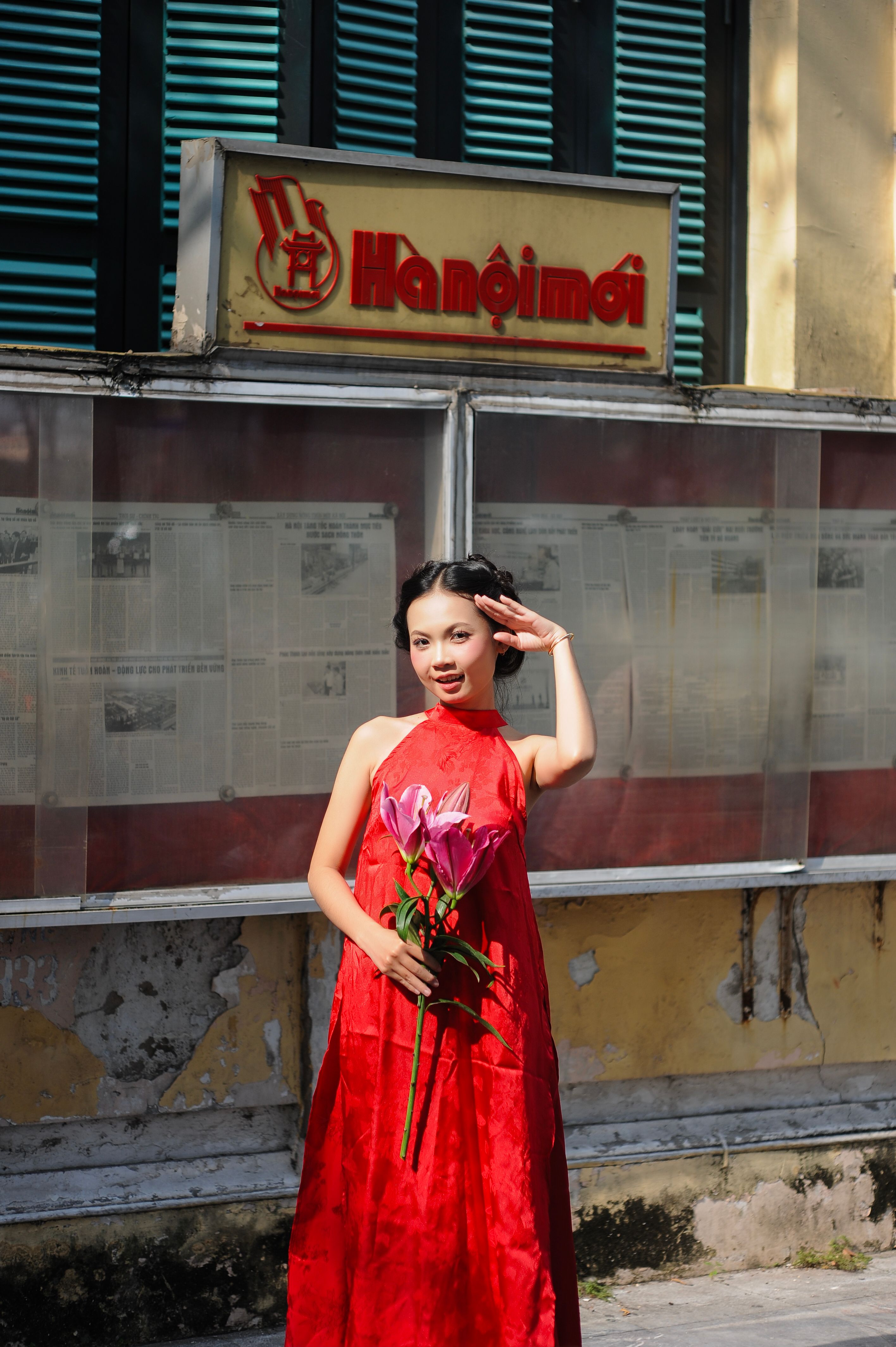 Woman in Red Dress Holding Lotus Flowers Outdoors · Free Stock Photo