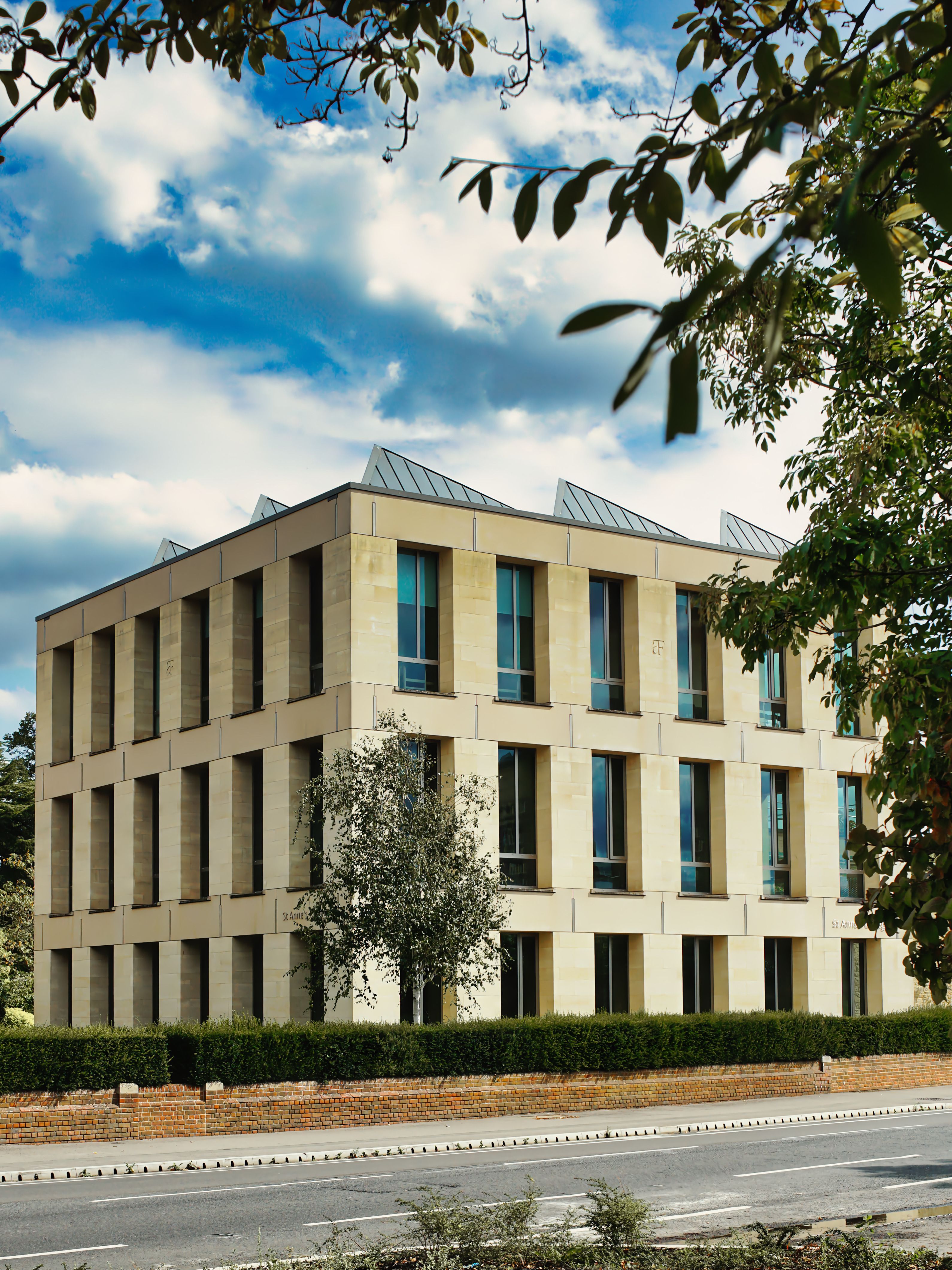 Modern Architectural Building Under Blue Sky · Free Stock Photo