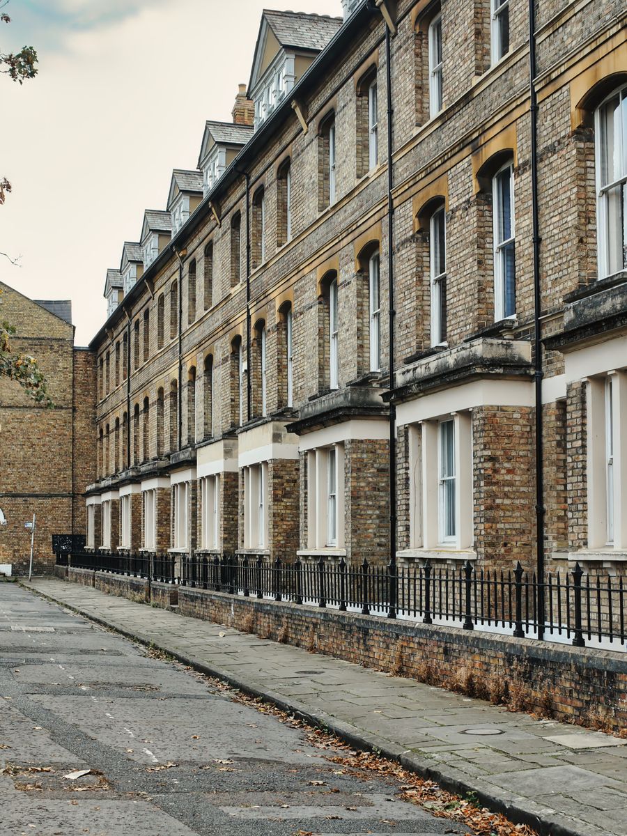 Illustrative Victorian brick terrace houses in Oxford with traditional windows
