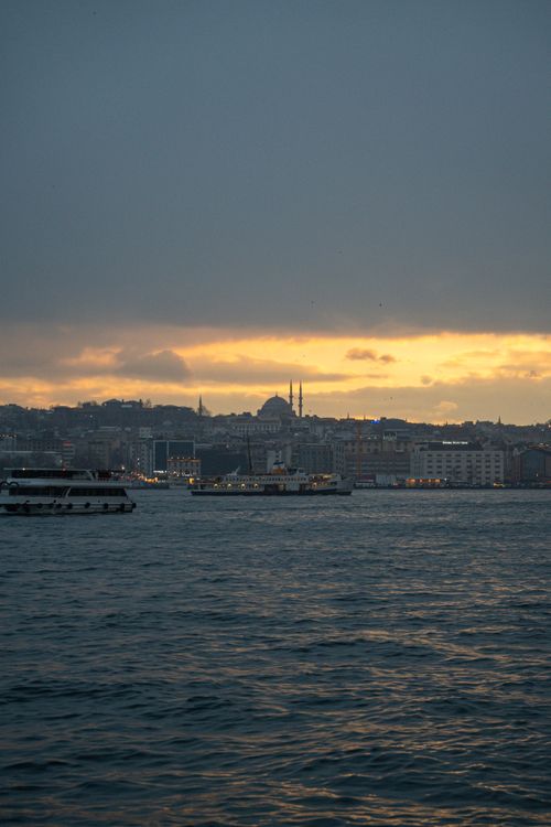 Free Scenic view of Istanbul skyline at sunset with Bosphorus Strait. Stock Photo
