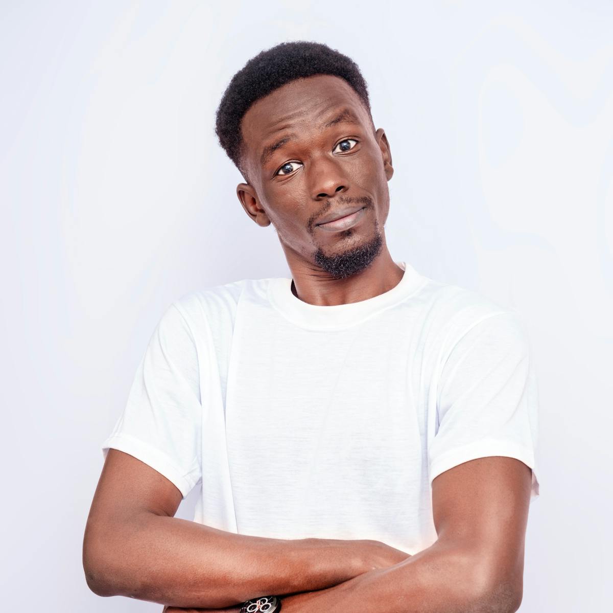 Confident man in casual pose — relaxed self-assurance