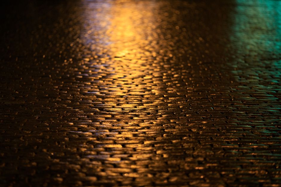 Detail of worn cobblestones in <span class="notranslate"><em>Madragoa</em></span>, exuding a sense of history.