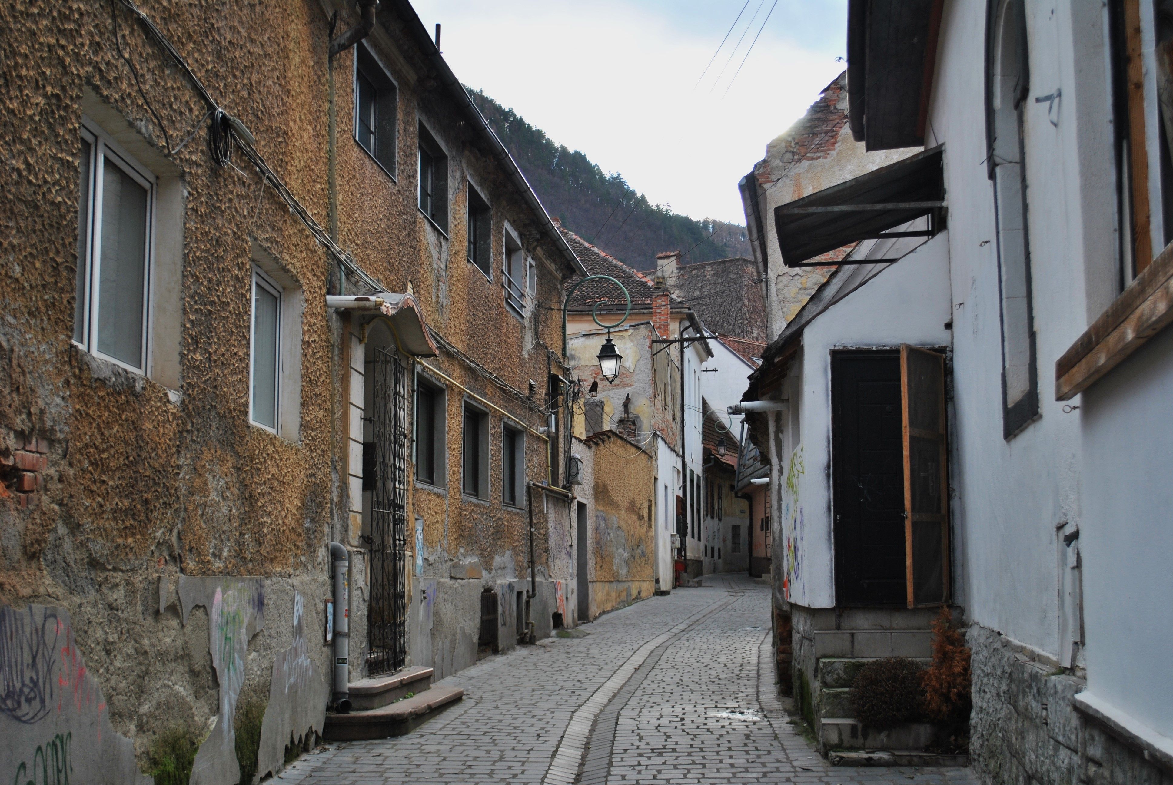 Charming Old Town Street with Rustic Houses · Free Stock Photo