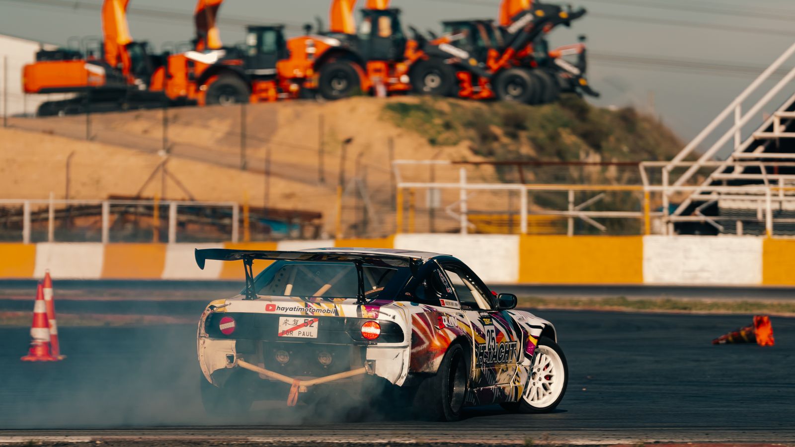 Representative colorful drift car sliding on a circuit; not a Formula DRIFT 2026 rules or inspection image. Photo by cnrdmroglu via Pexels.
