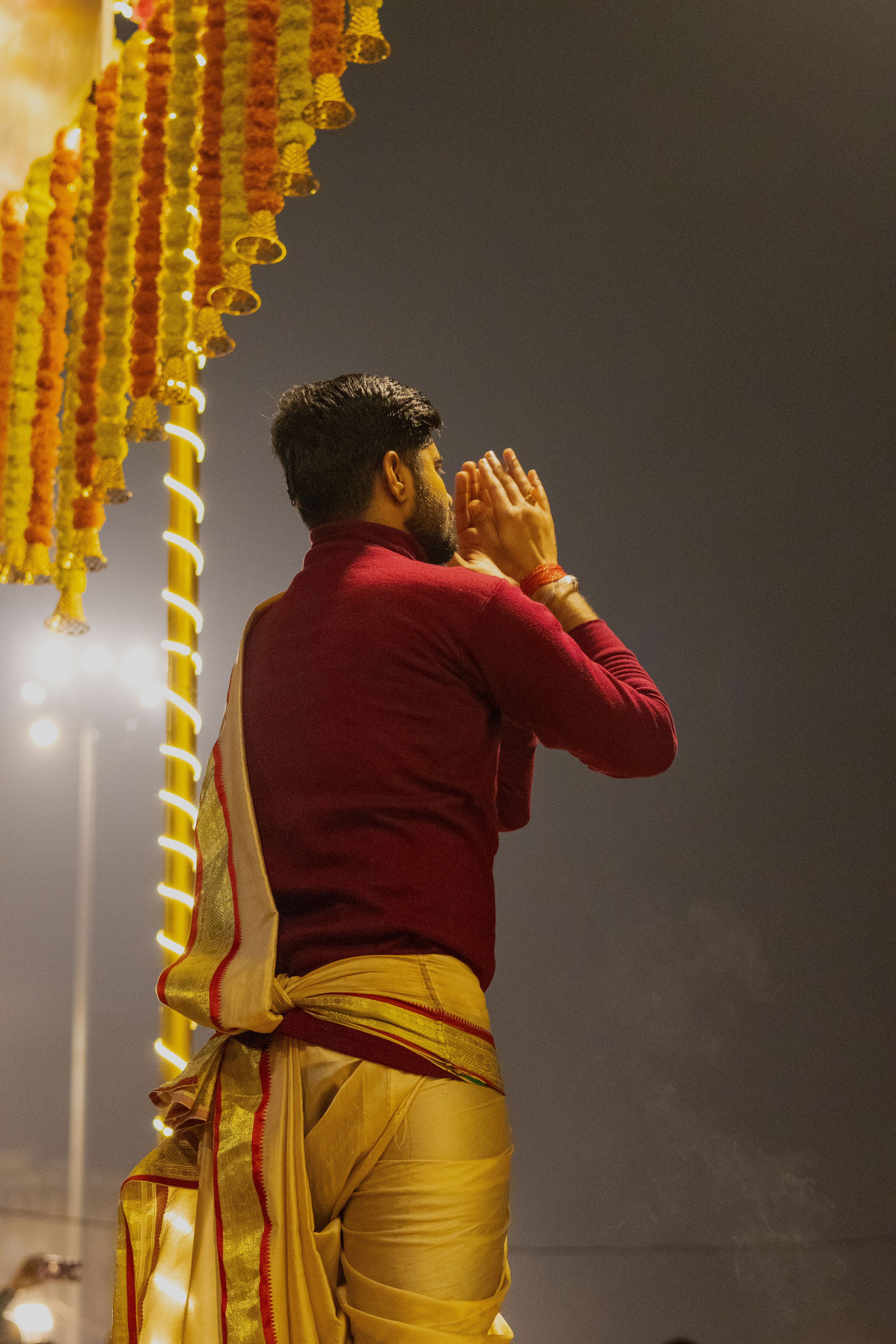 Man in Traditional Attire During Ritual Ceremony · Free Stock Photo