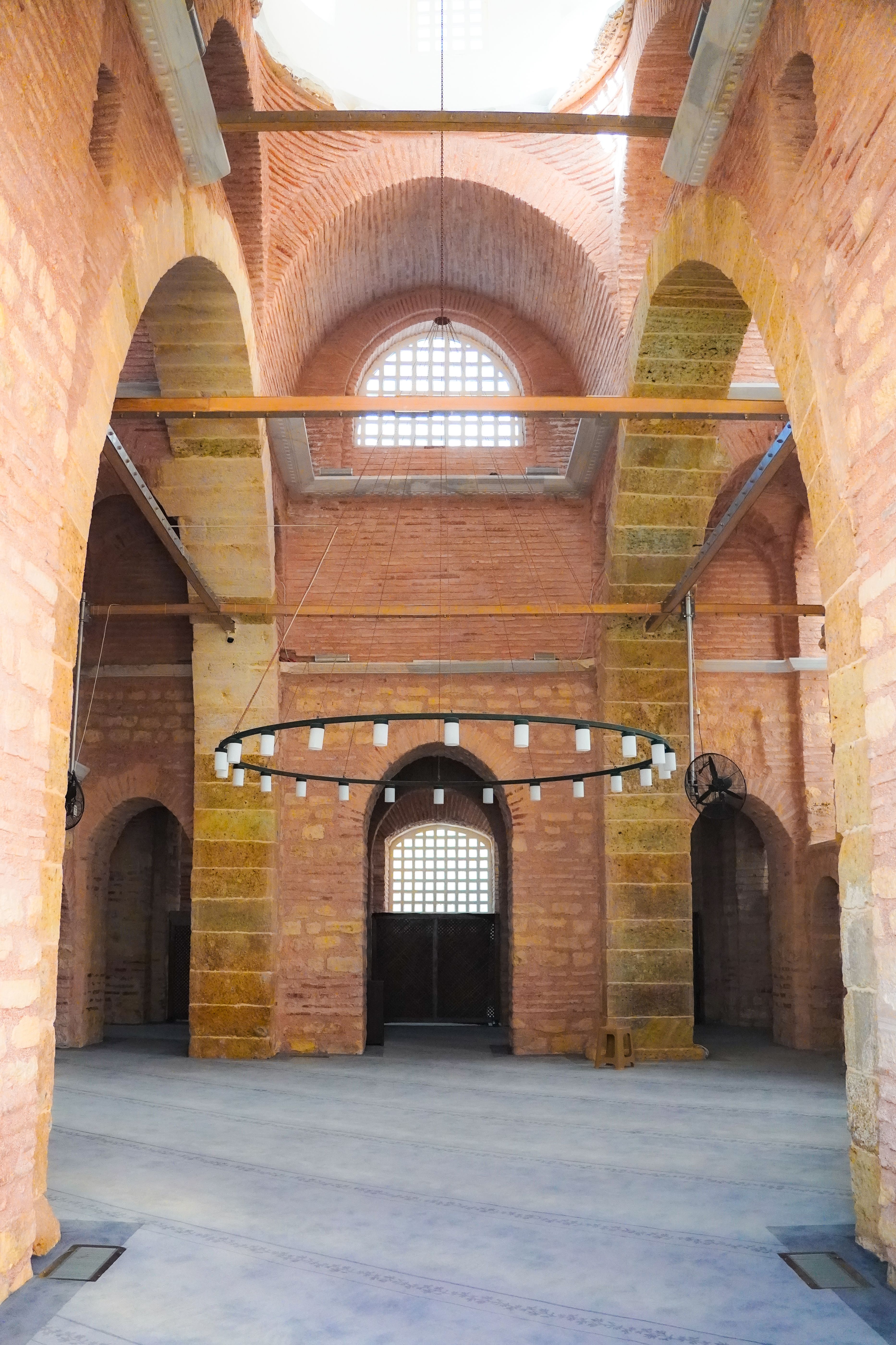 Free Captivating architectural details inside a historic mosque in Istanbul, showcasing arches and lighting. Stock Photo
