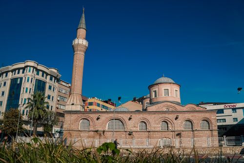 Free Stunning view of a historic mosque in Istanbul, Turkey with bright architectural details under a clear blue sky. Stock Photo