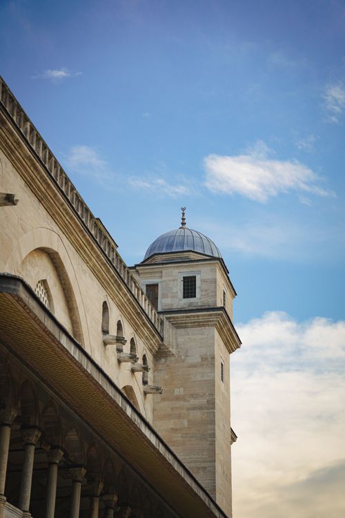 Free Beautiful angle of Istanbul mosque showing architectural elegance against a clear blue sky. Stock Photo