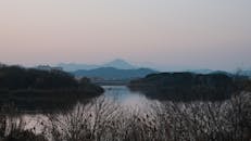 Serene Lake at Sunset with Mountain View