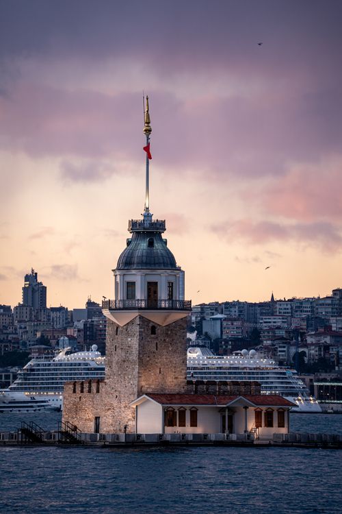 Free Beautiful dusk view of the iconic Maiden's Tower with Istanbul's skyline in the background. Stock Photo