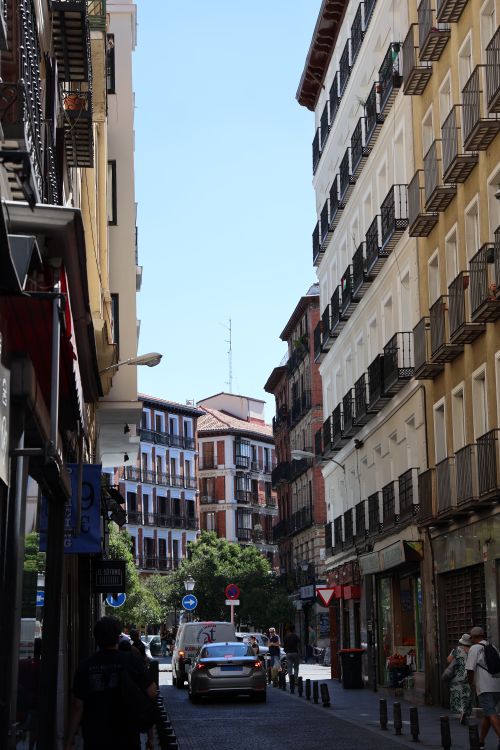 Free Vibrant streetscape of Madrid showcasing classic European architecture and bustling city life. Stock Photo