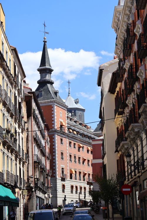 Free Discover the charming architecture of Madrid with its historic buildings under the clear blue sky. Stock Photo