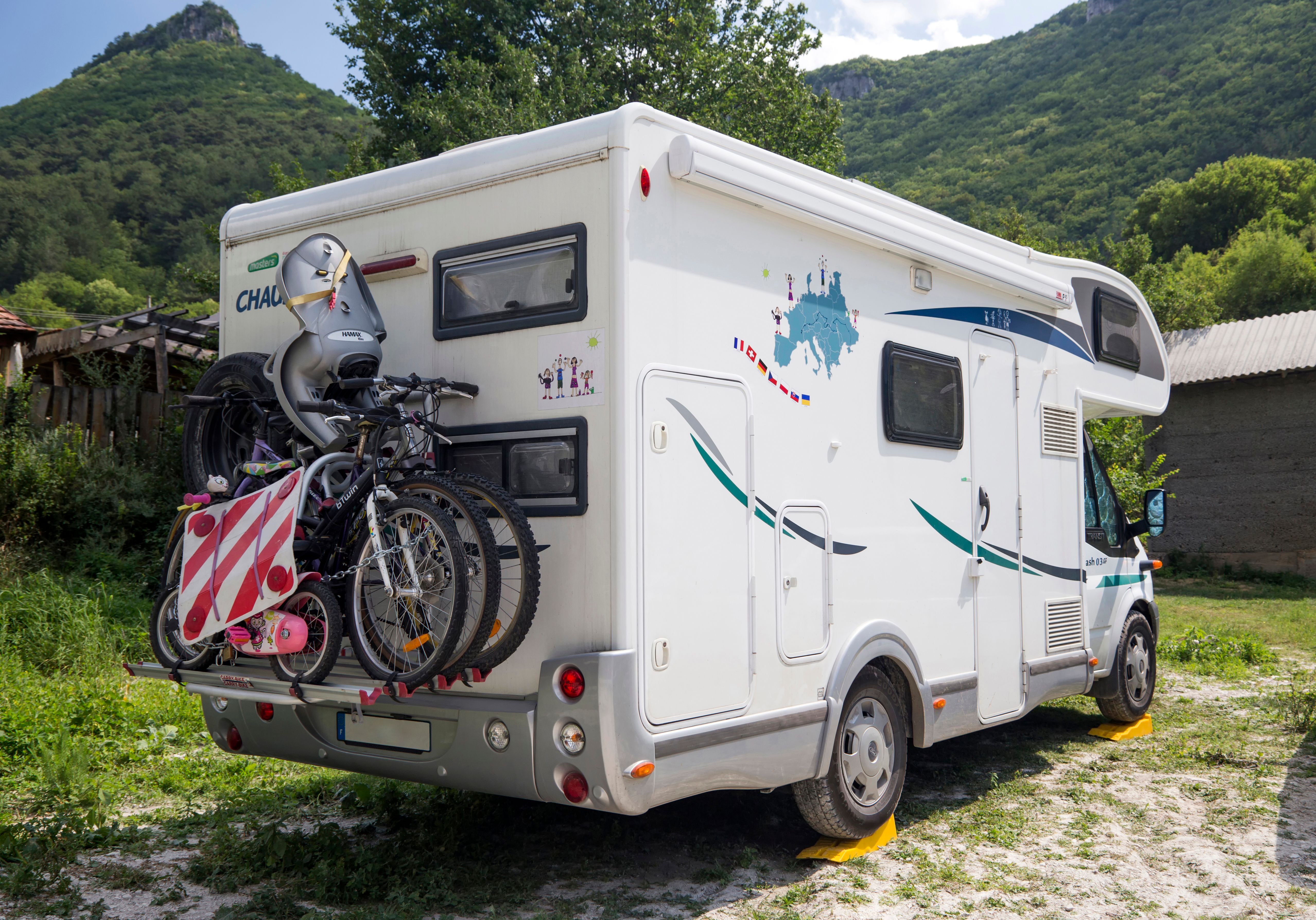 RV with bicycles ready for outdoor adventure · Free Stock Photo
