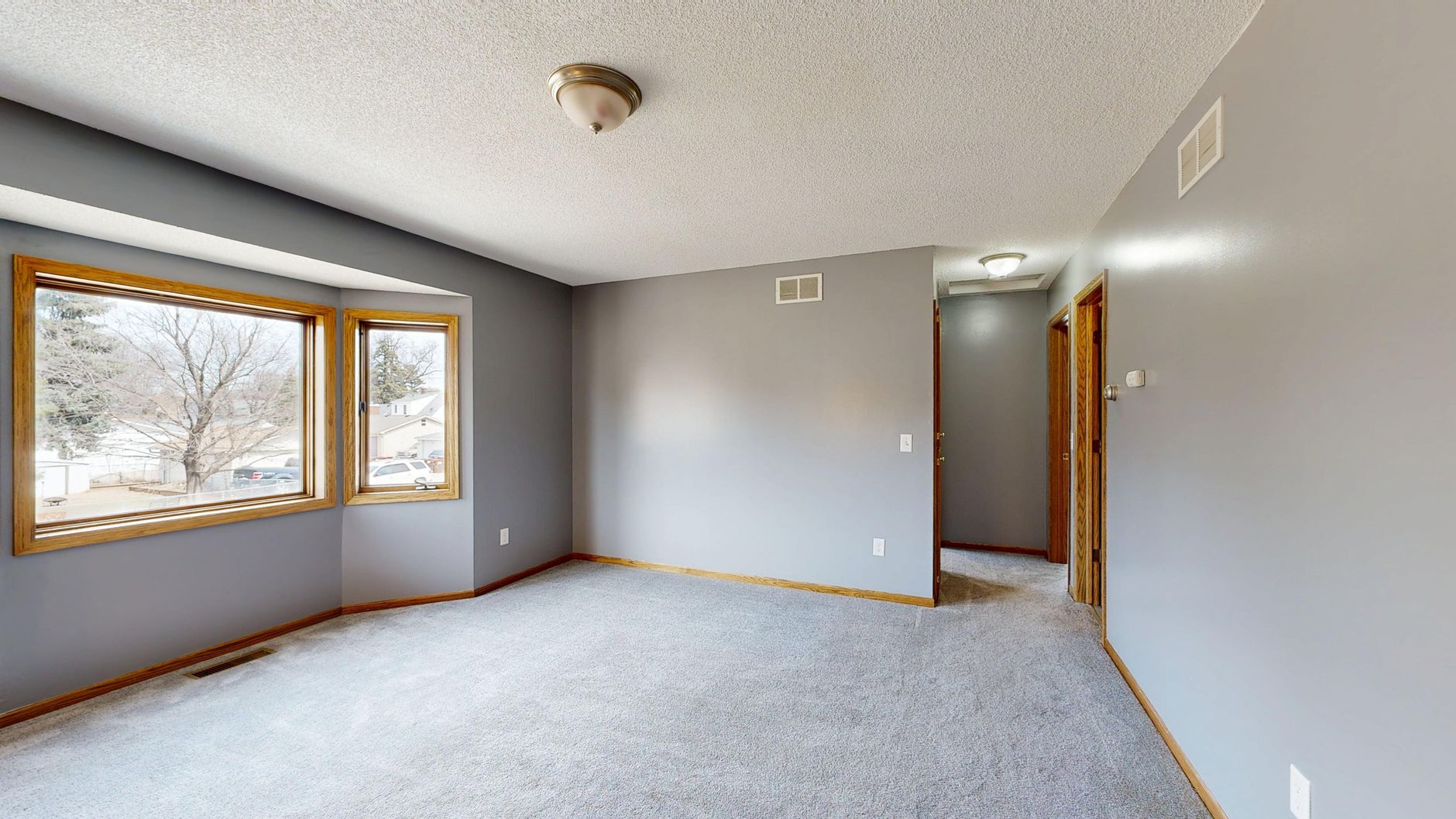 family settling into warm transitional room