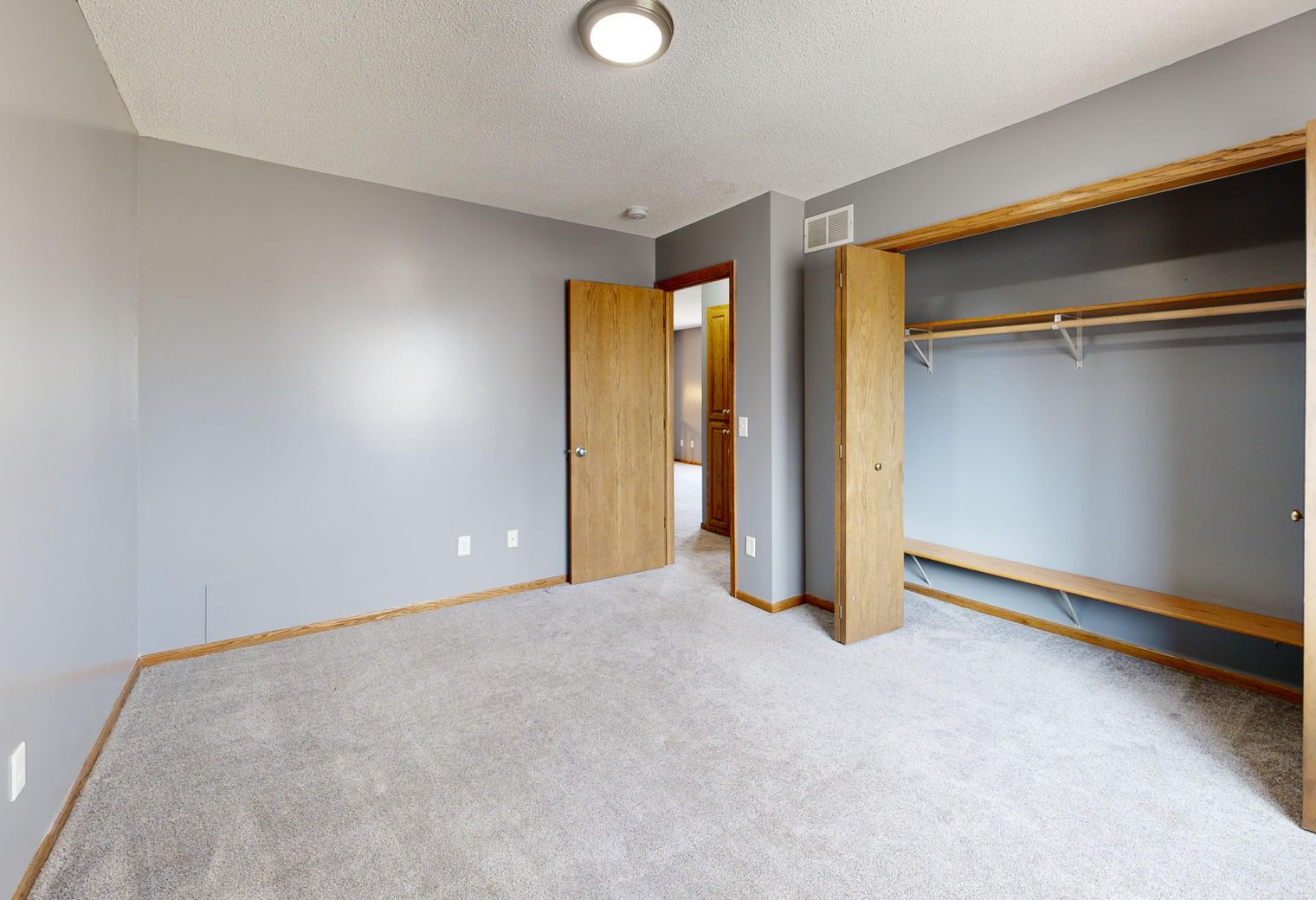 Masonry and Render Painting in Wembley — a decorator at work mid-project