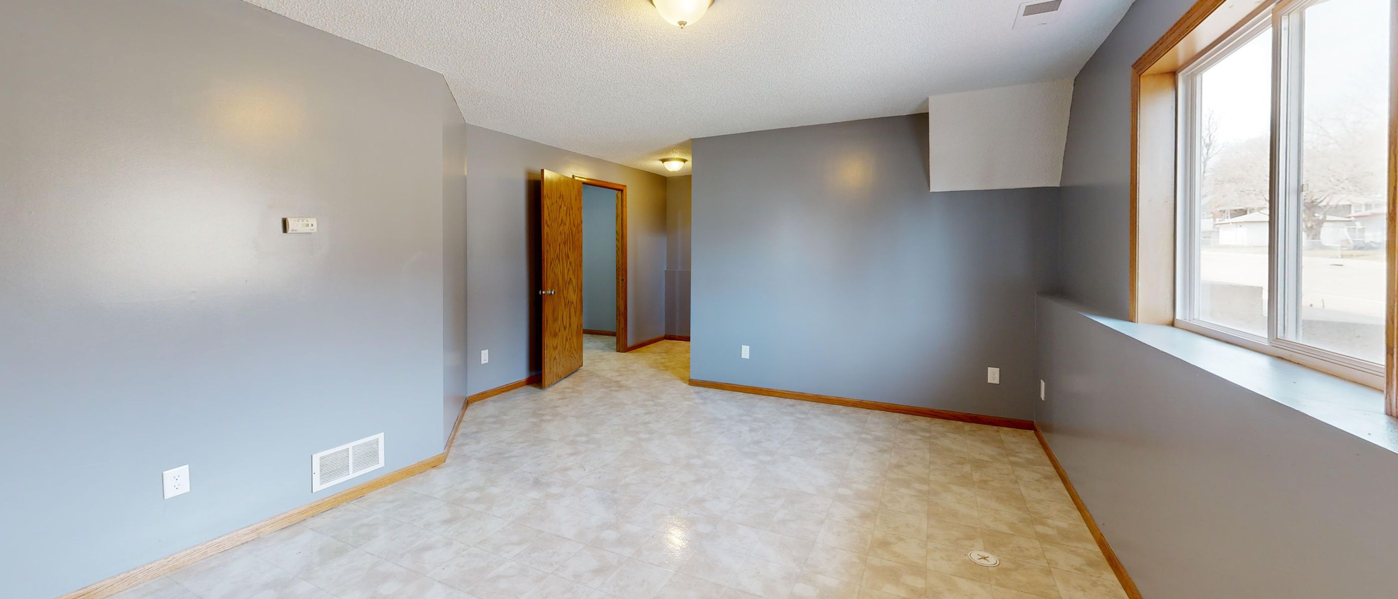 Plastering and Skimming in Castelnau — a decorator at work mid-project