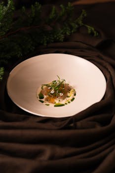 Elegant plated gourmet dish at a high-end Tokyo restaurant, showcasing culinary artistry.