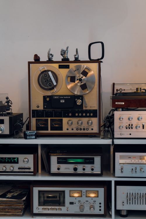 Free Classic collection of vintage audio equipment featuring a reel-to-reel tape recorder and amplifiers. Stock Photo