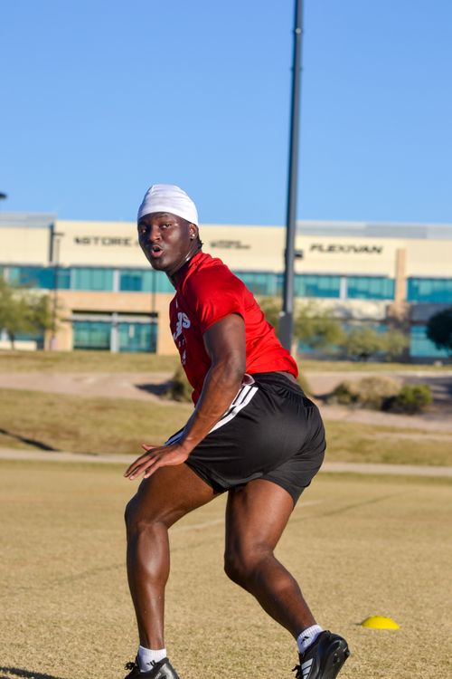 Free Athlete in football training, focusing on agility drills in Scottsdale, Arizona. Stock Photo
