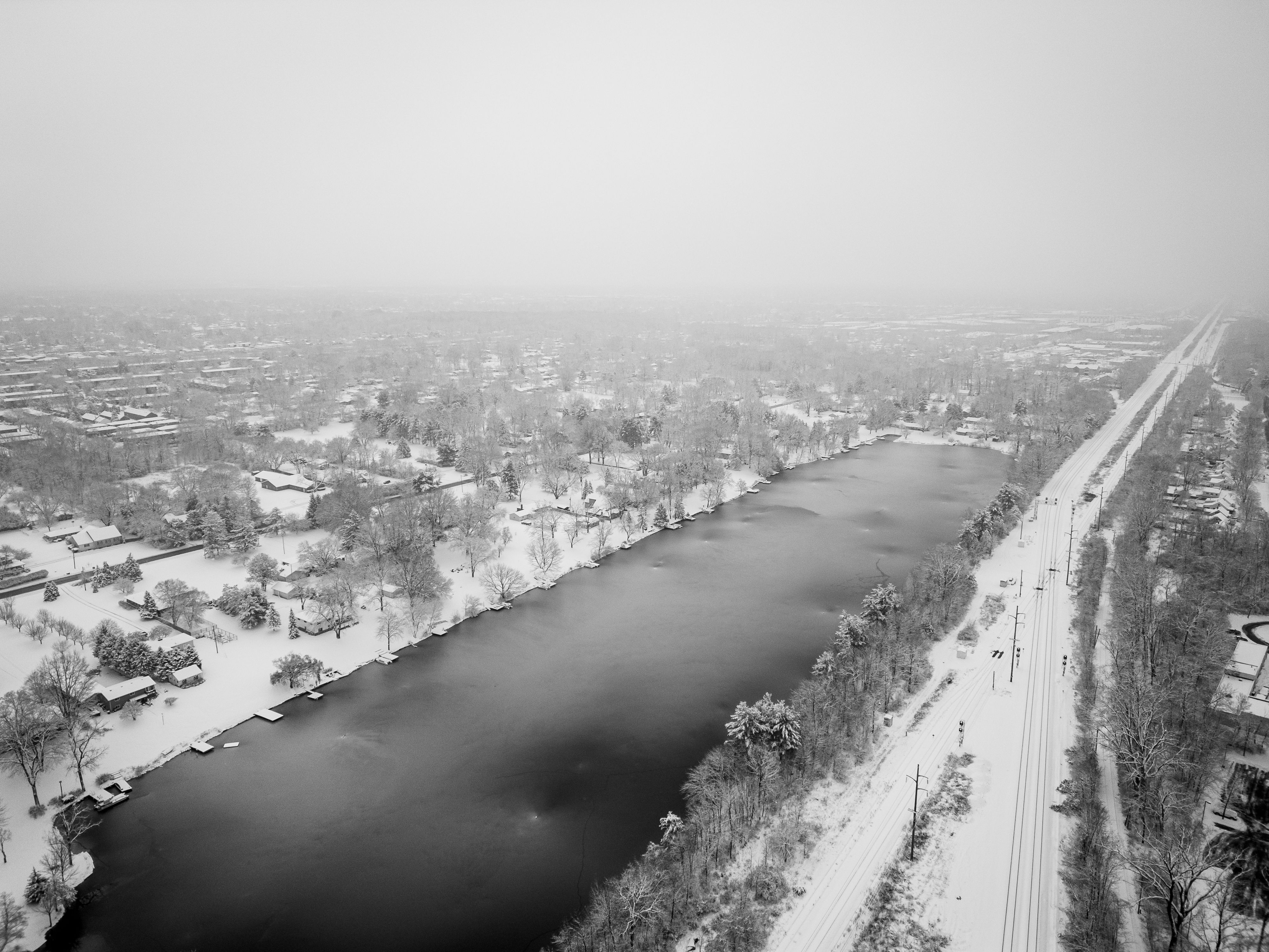 Aerial Winter Landscape of Snowy River and City · Free Stock Photo