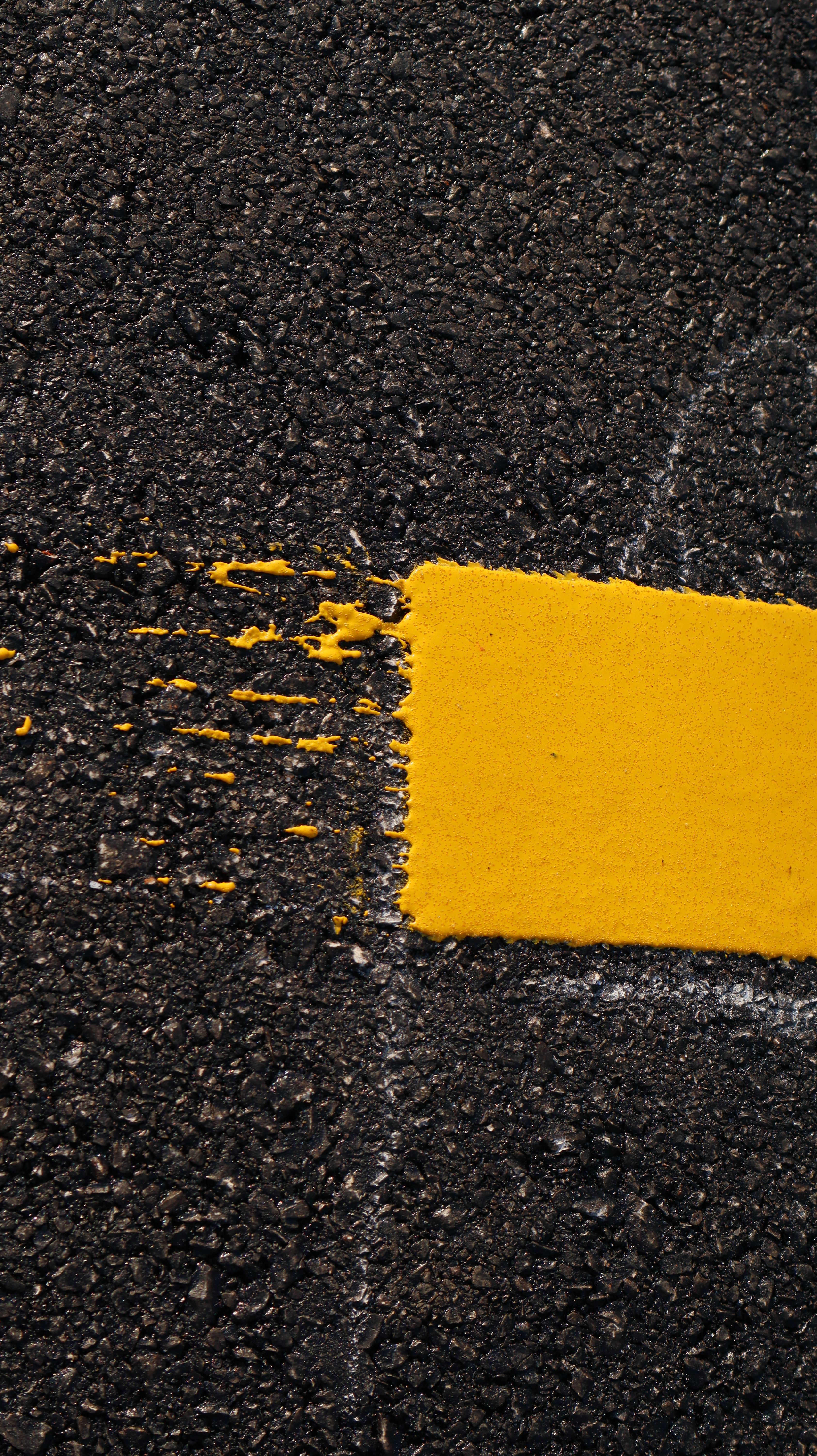 Close-up of road marking texture on asphalt