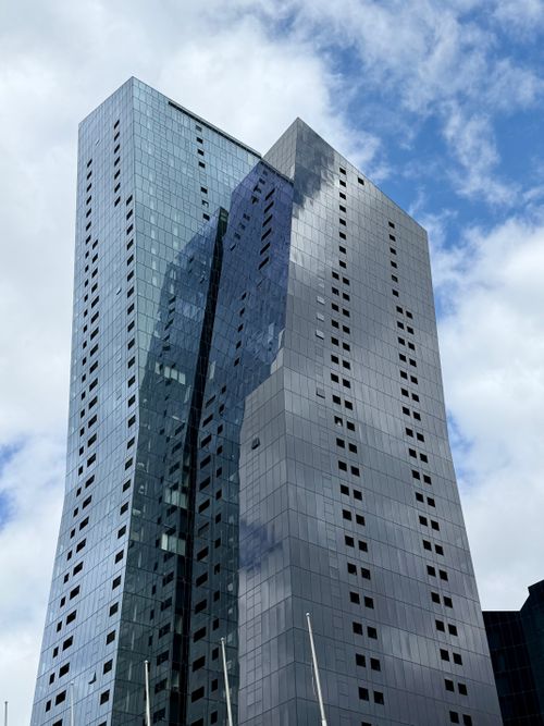 Free Reflective skyscraper with geometric facade in Southbank, Melbourne, Australia. Stock Photo