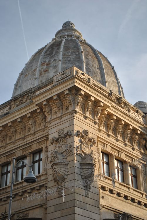 Free A close-up of a historic ornate building dome on a clear day. Stock Photo