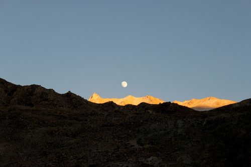 Free Beautiful moonrise over rugged mountains in Nako, Himachal Pradesh, India during sunset. Stock Photo