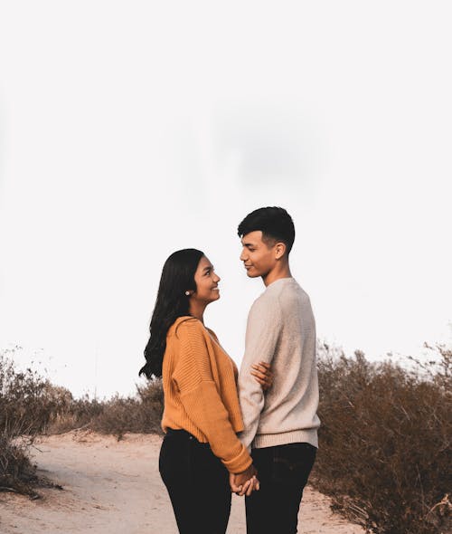 Photo Of Couple Looking At Each Other