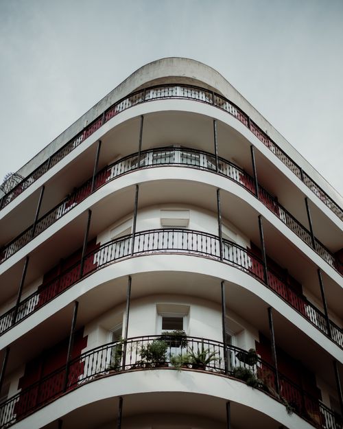 Free Close-up view of a modern apartment building with balconies and plants. Stock Photo