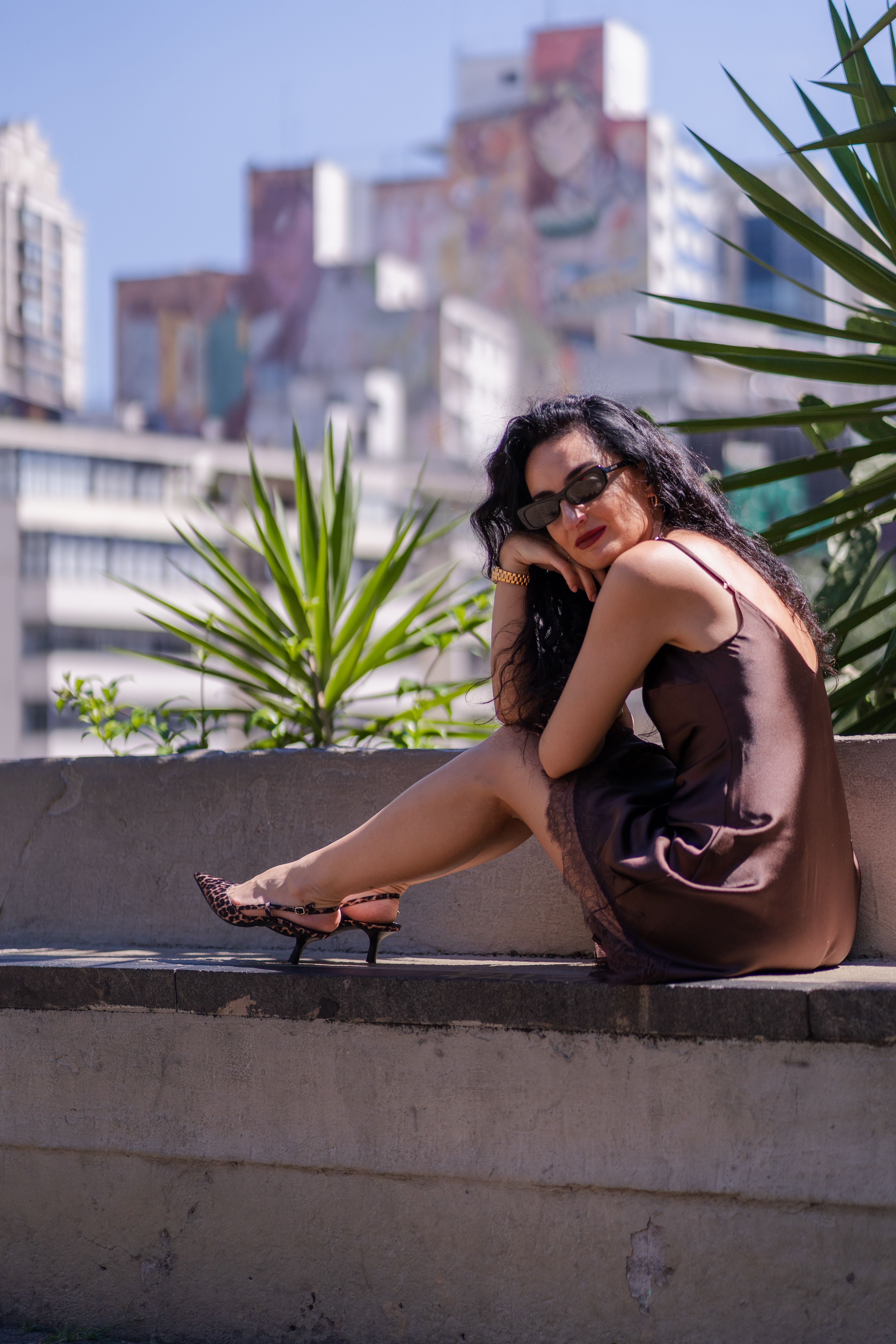 Stylish Woman Posing in Urban Setting · Free Stock Photo