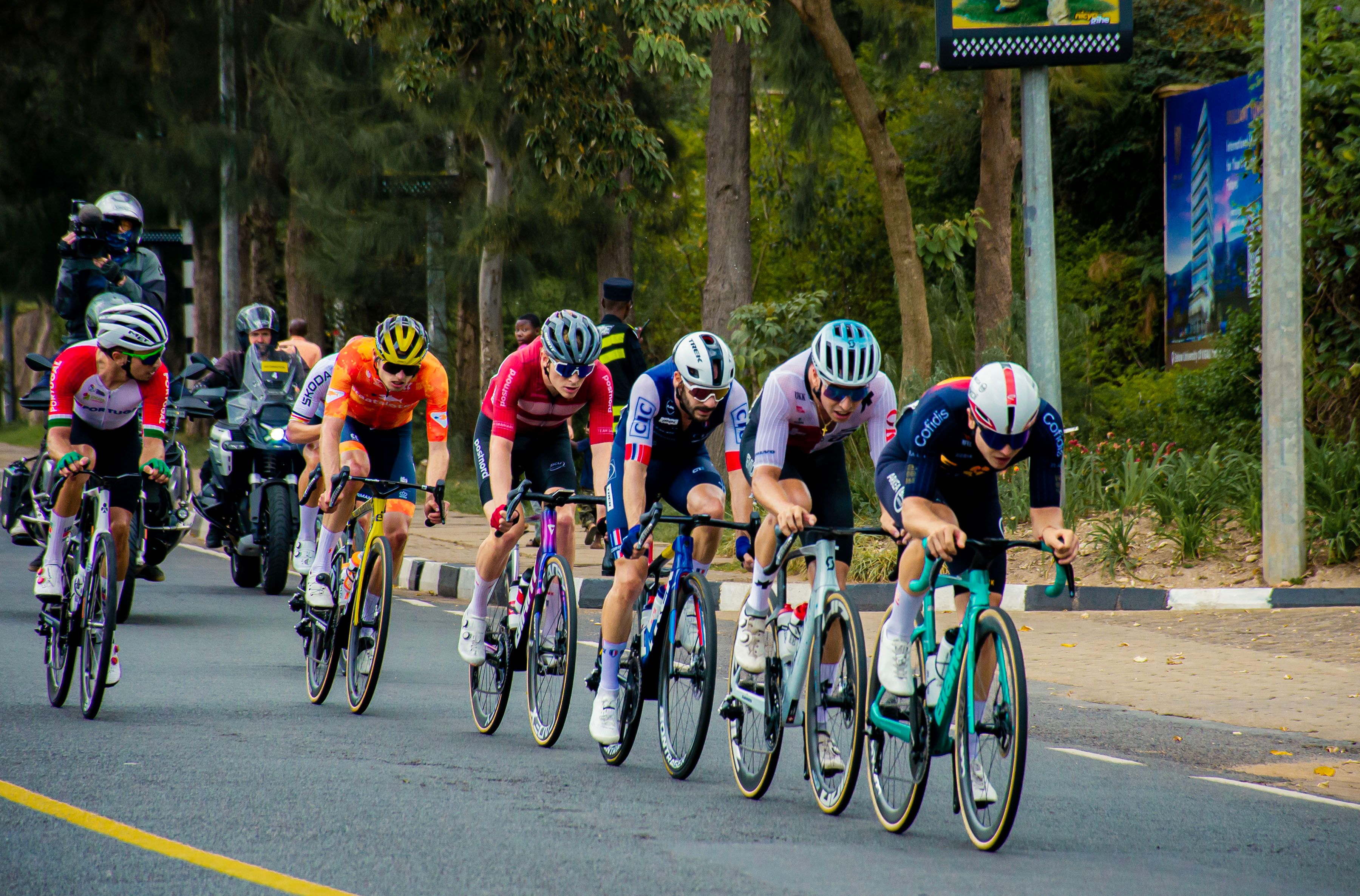 Competitive Cyclists Racing in an Outdoor Event · Free Stock Photo