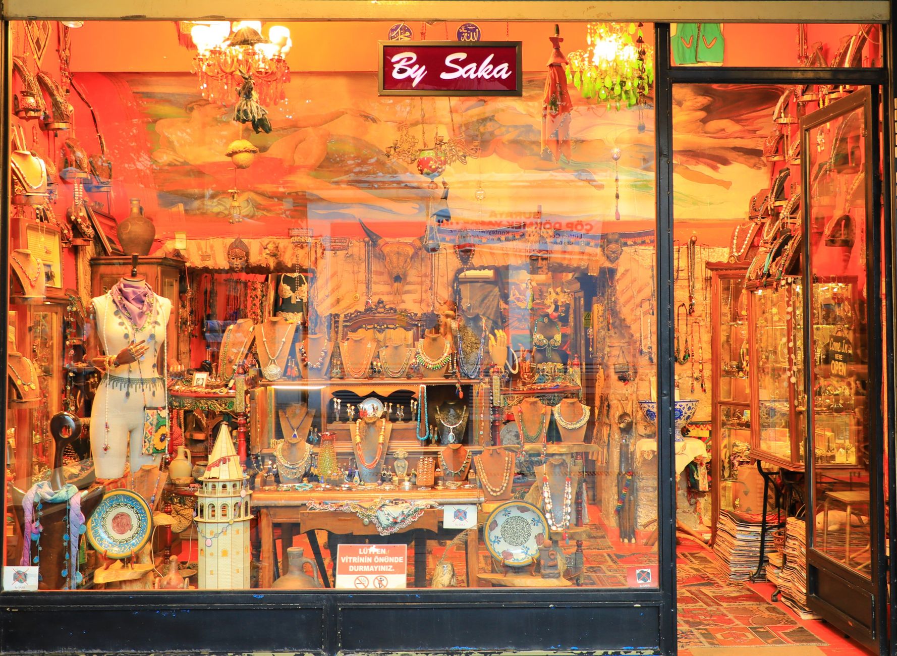 Colorful view of a jewelry shop window in Istanbul, showcasing ornate items.