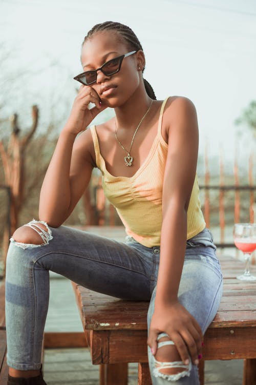 Photo Of Woman Wearing Yellow Tank Top