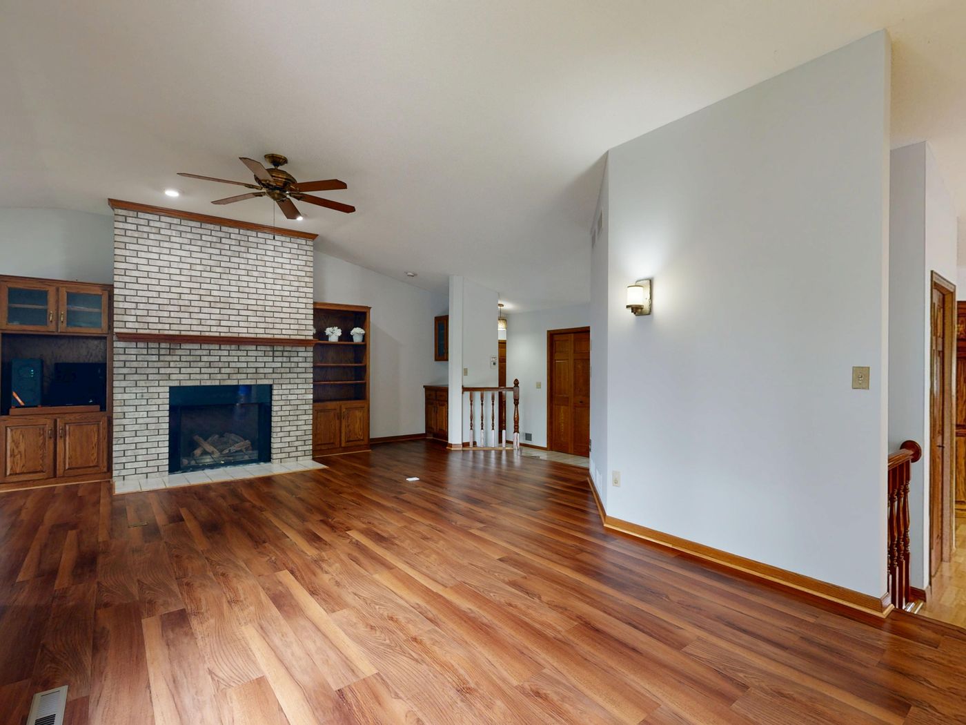 Customized built-in wooden furniture and storage in a modern living room