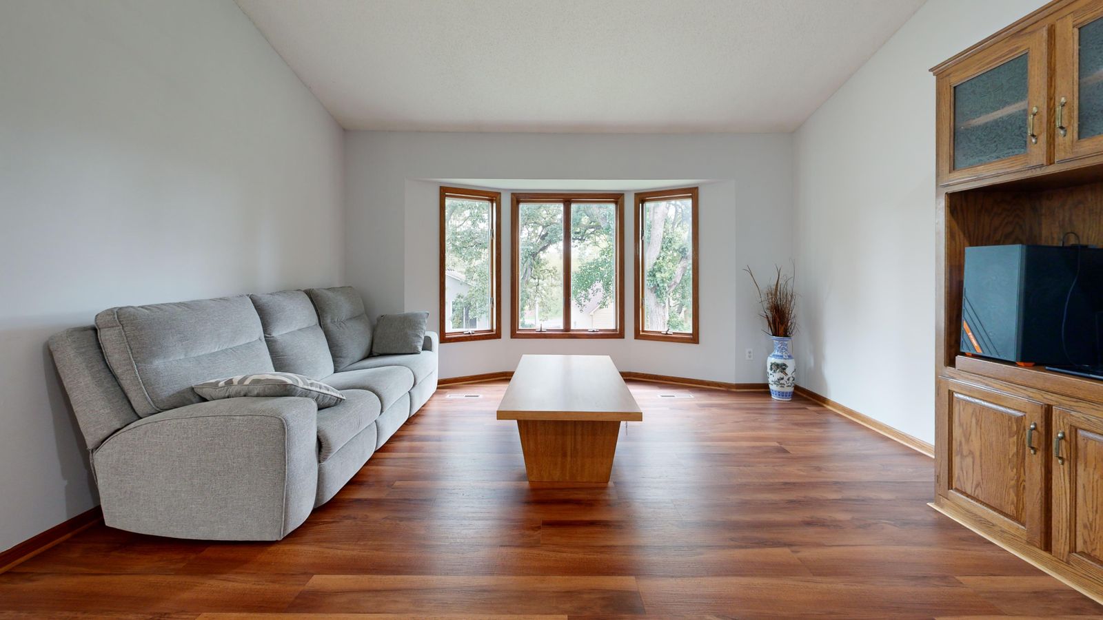 Natural timber flooring in a clean modern living room