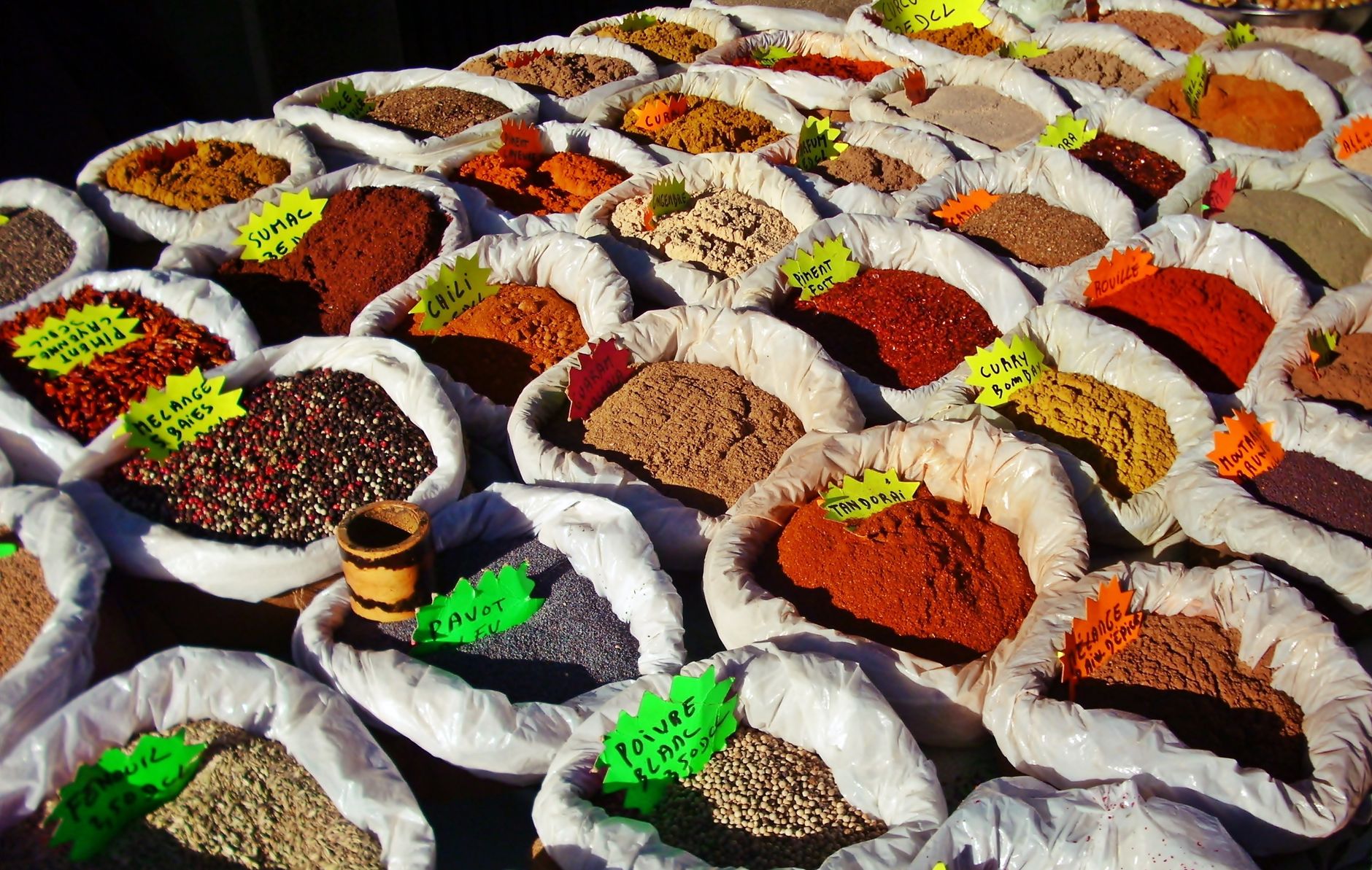 Sacks of red chillies and spices stacked in the Khari Baoli wholesale spice market
