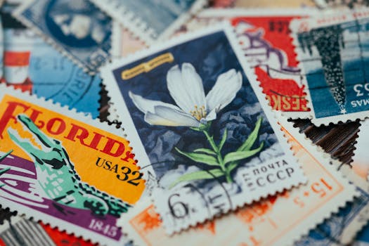 A captivating image showcasing a diverse collection of vintage postage stamps with vibrant designs.