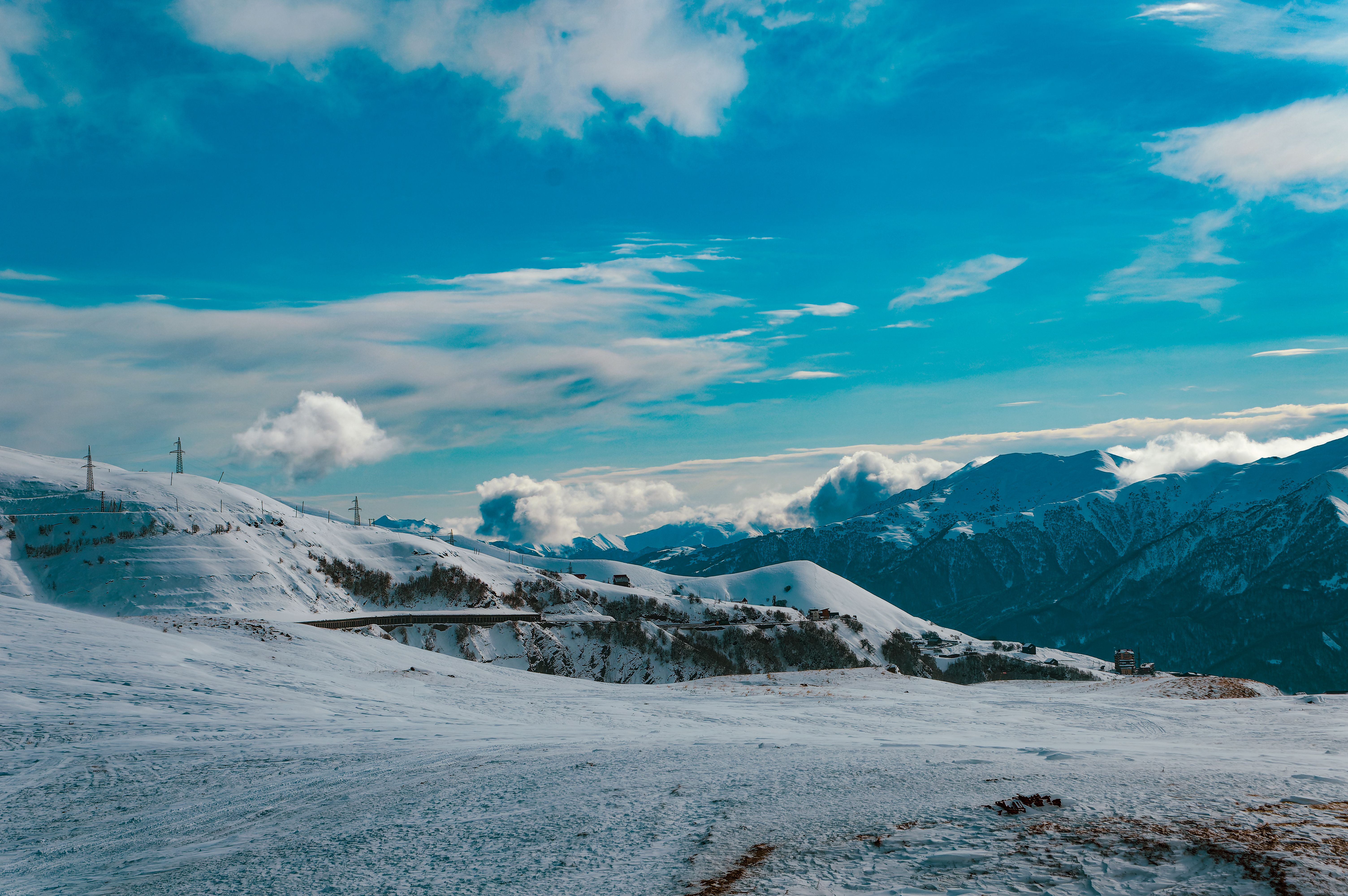 Snow-Capped Mountain Range Under Clear Blue Sky · Free Stock Photo