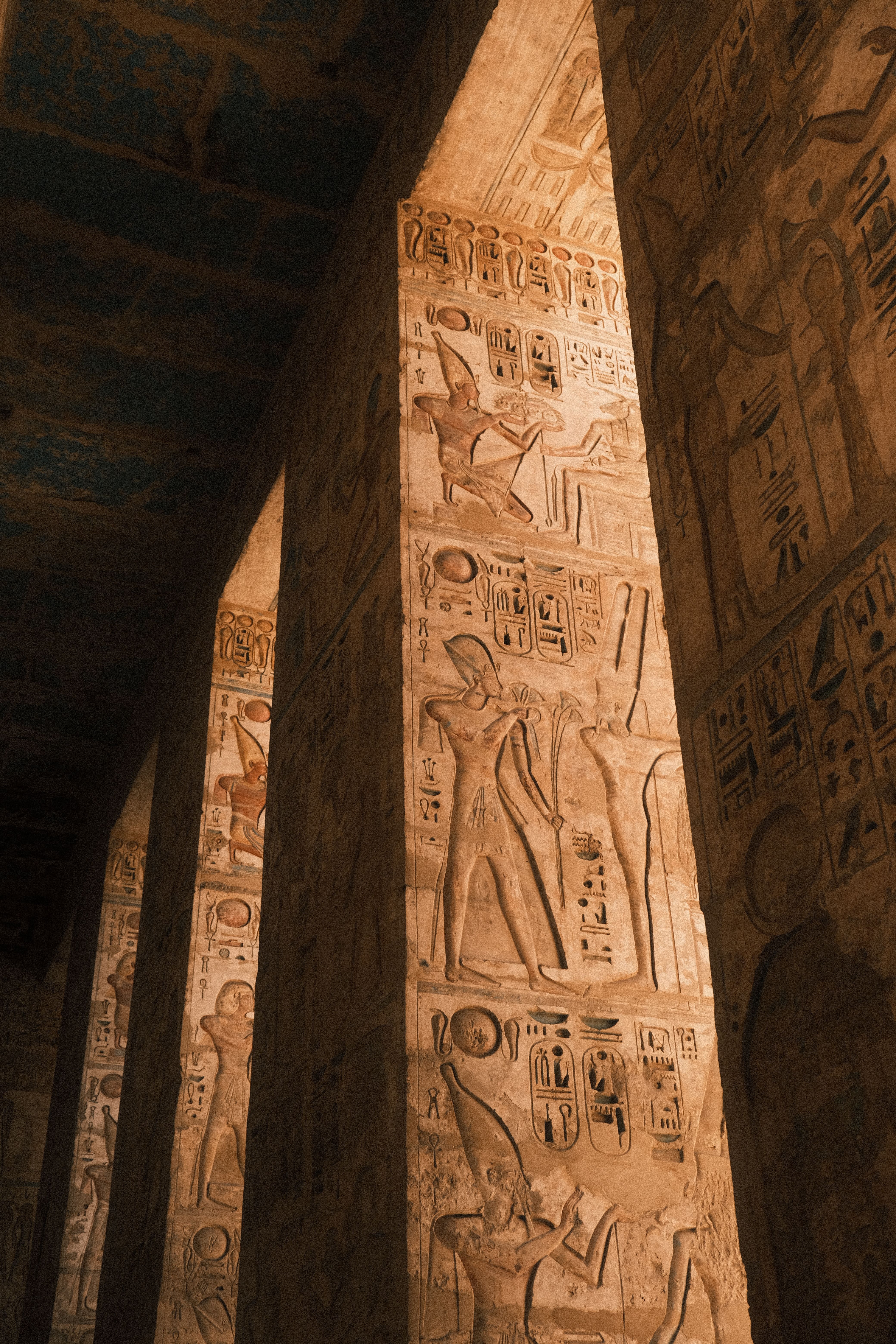Intricate hieroglyphs on ancient temple columns in Luxor, Egypt, showcasing Egyptian heritage.. pexels, intricate, hieroglyph