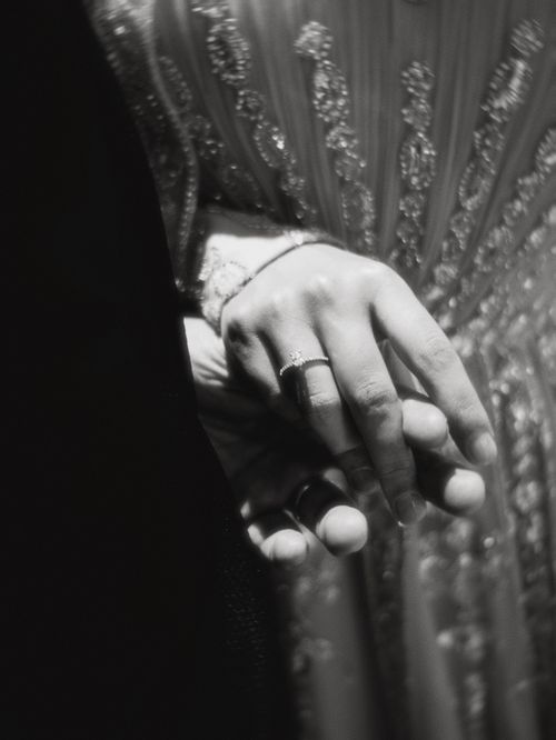 Free Closeup of hands joined in marriage, highlighting wedding rings. Stock Photo