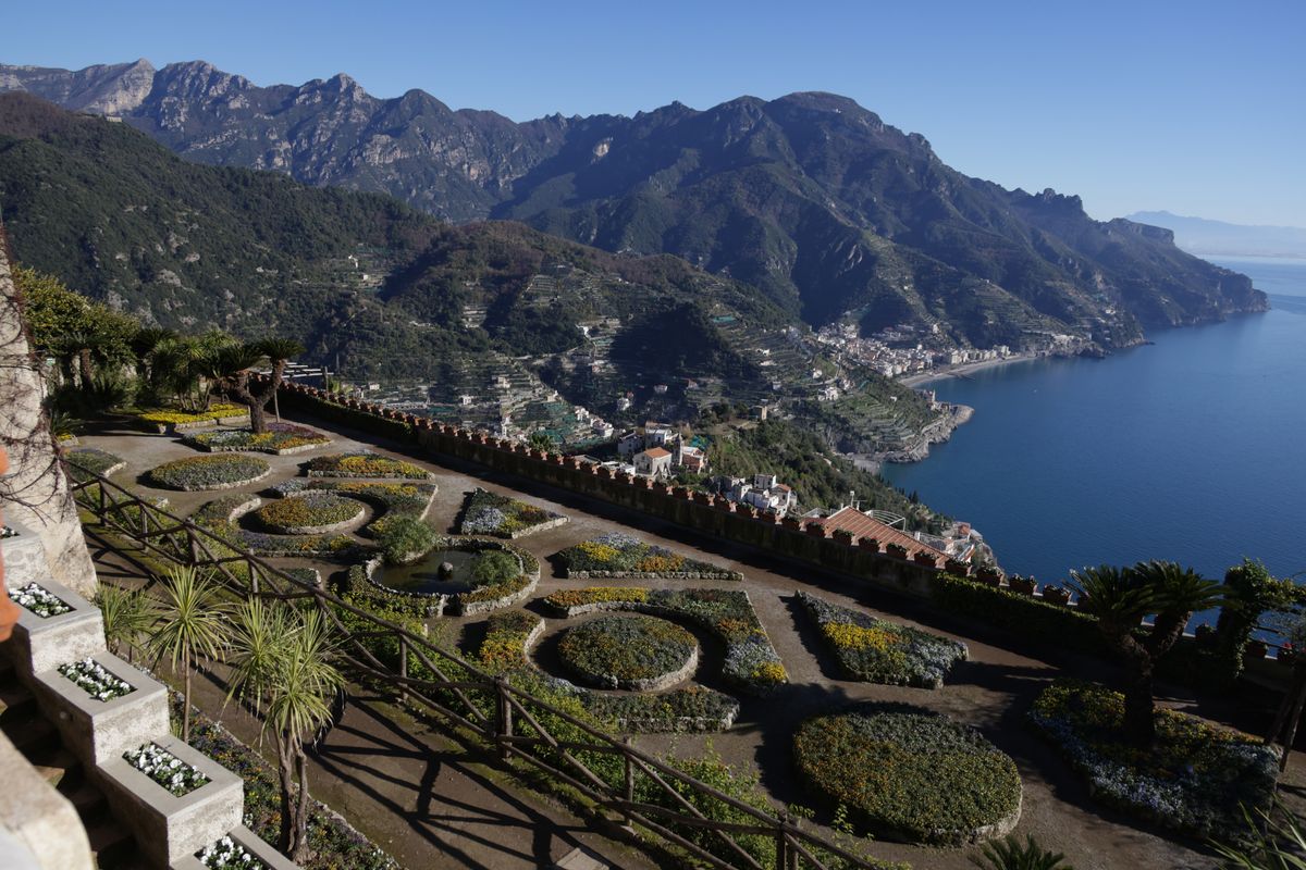 Ravello's terraced coastline view — 40 km of Amalfi Coast visible from a mountain village of composers and novelists.