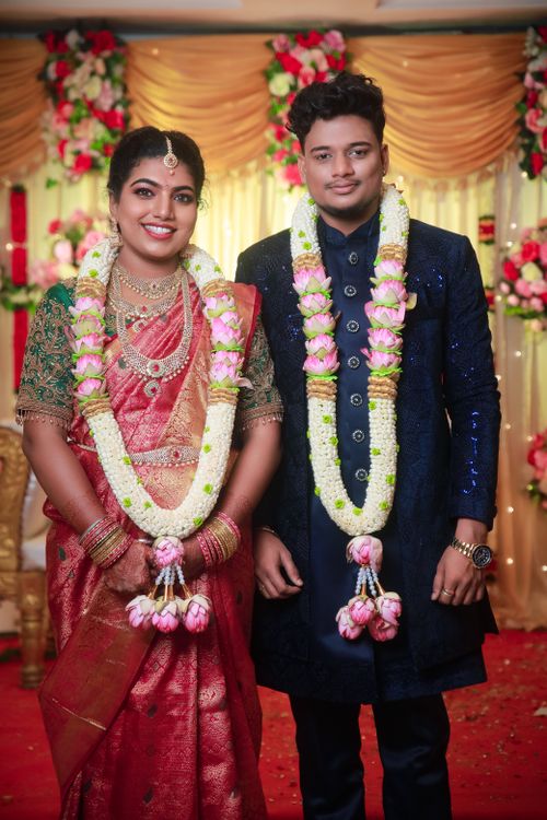 Free Beautiful portrait of a South Indian couple in elegant wedding attire in Chennai. Stock Photo