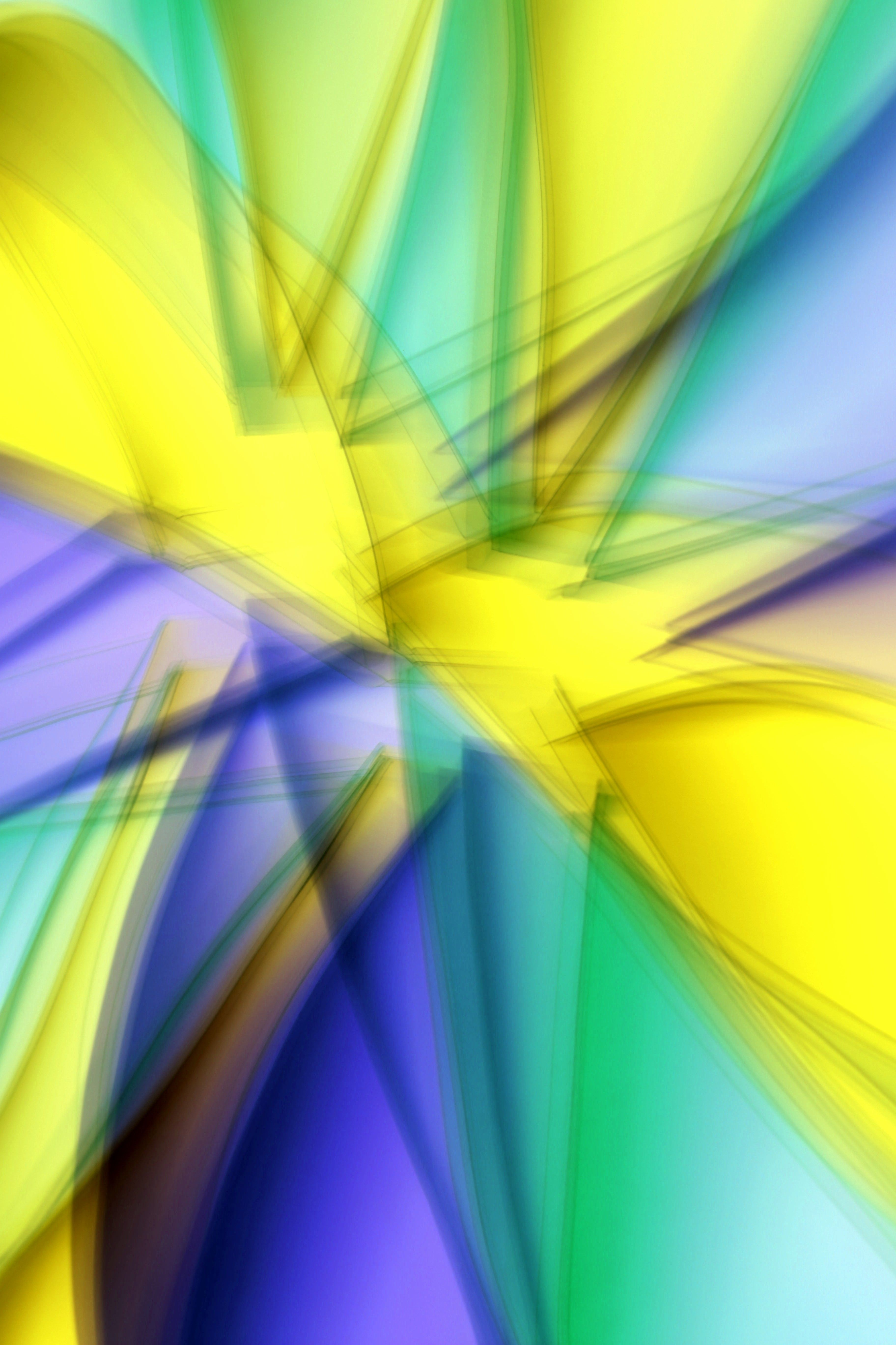 Colorful abstract art featuring dynamic lines and vibrant hues, creating a sense of motion.