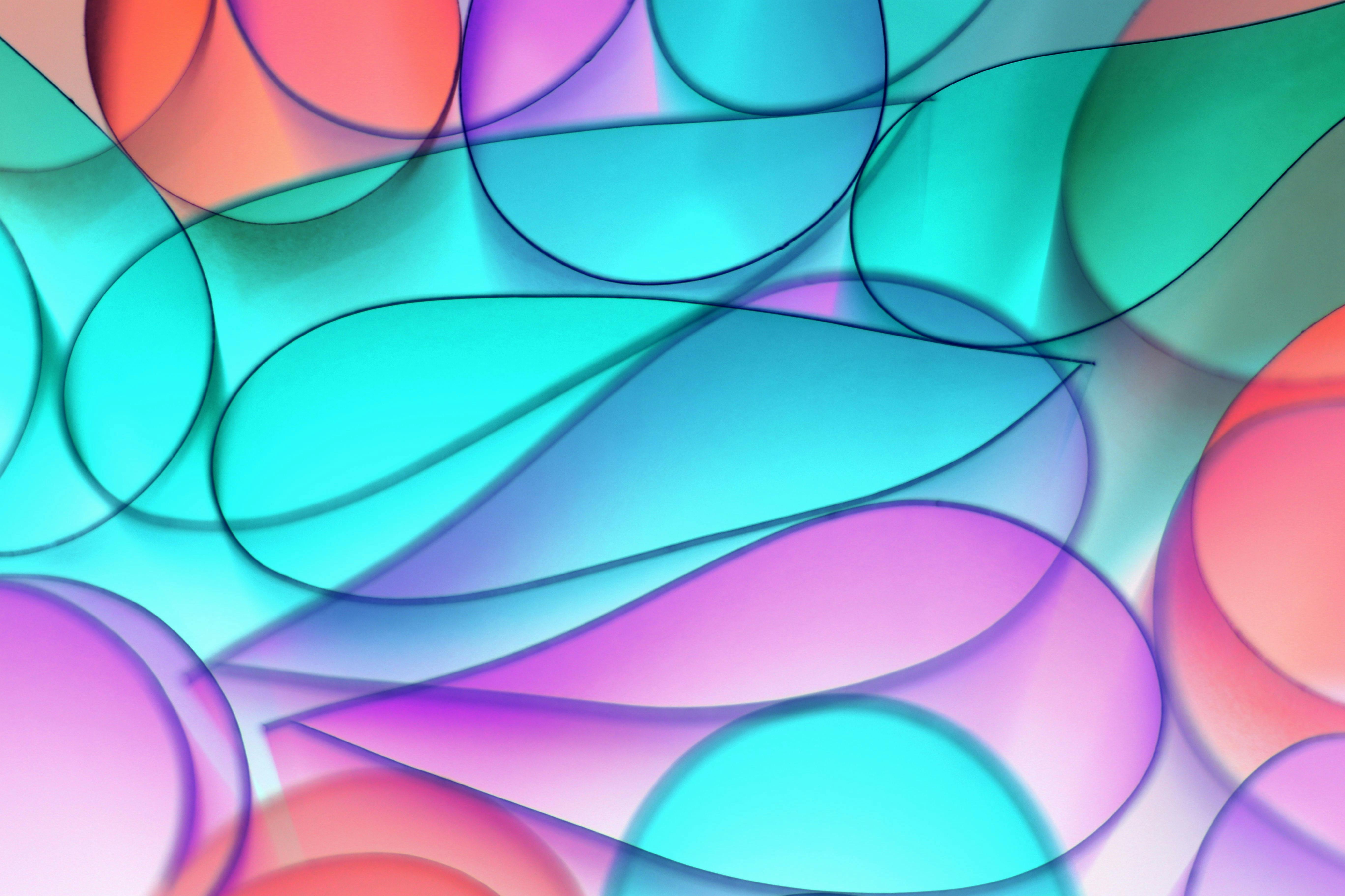 Vibrant abstract pattern with colorful glass shapes and gradients.