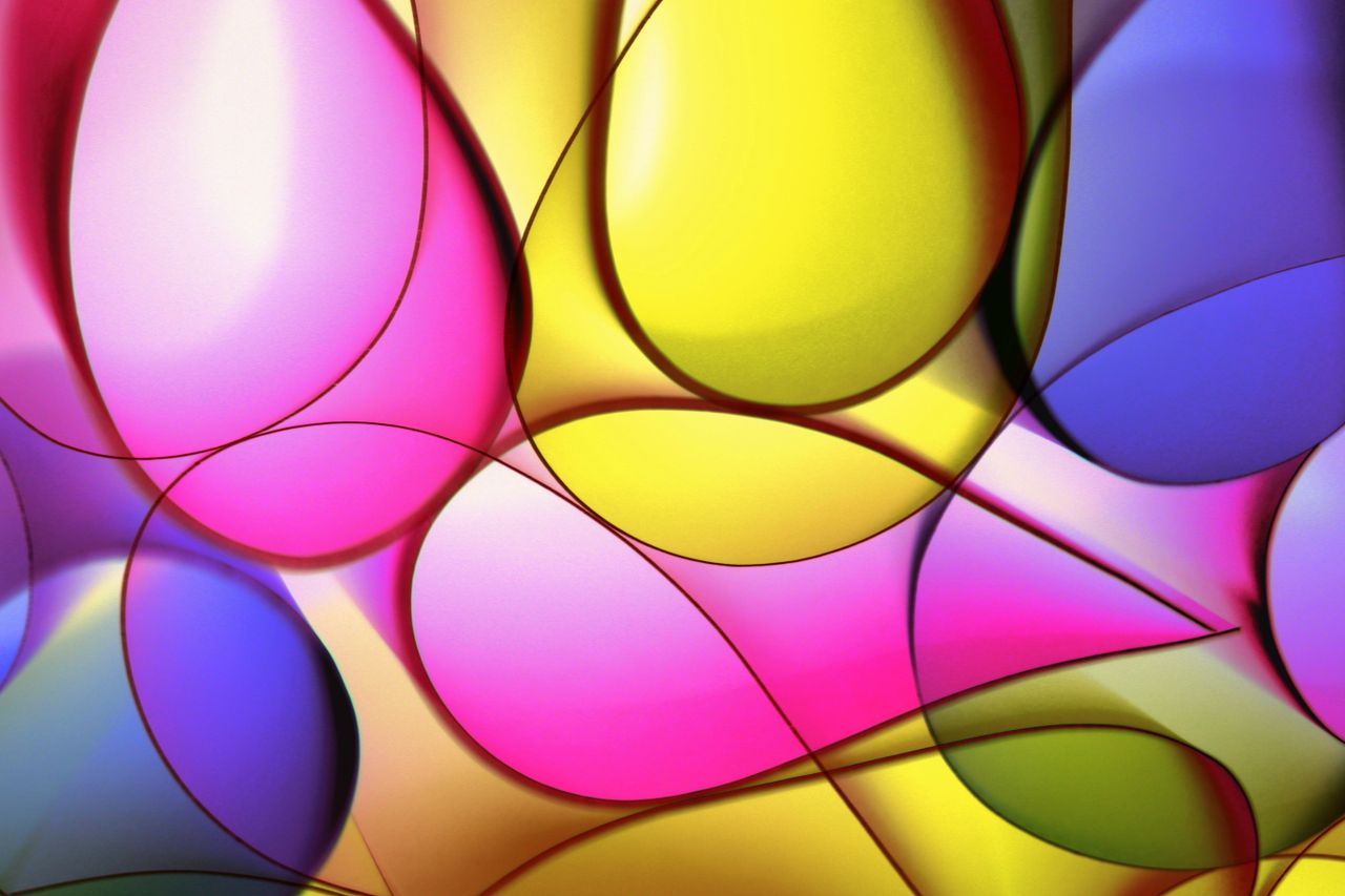 a vibrant abstract image showcasing overlapping colorful shapes in bri
